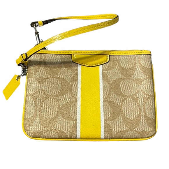 Coach Handbags - Yellow stripe Coach signature wristlet. Beautiful condition.
